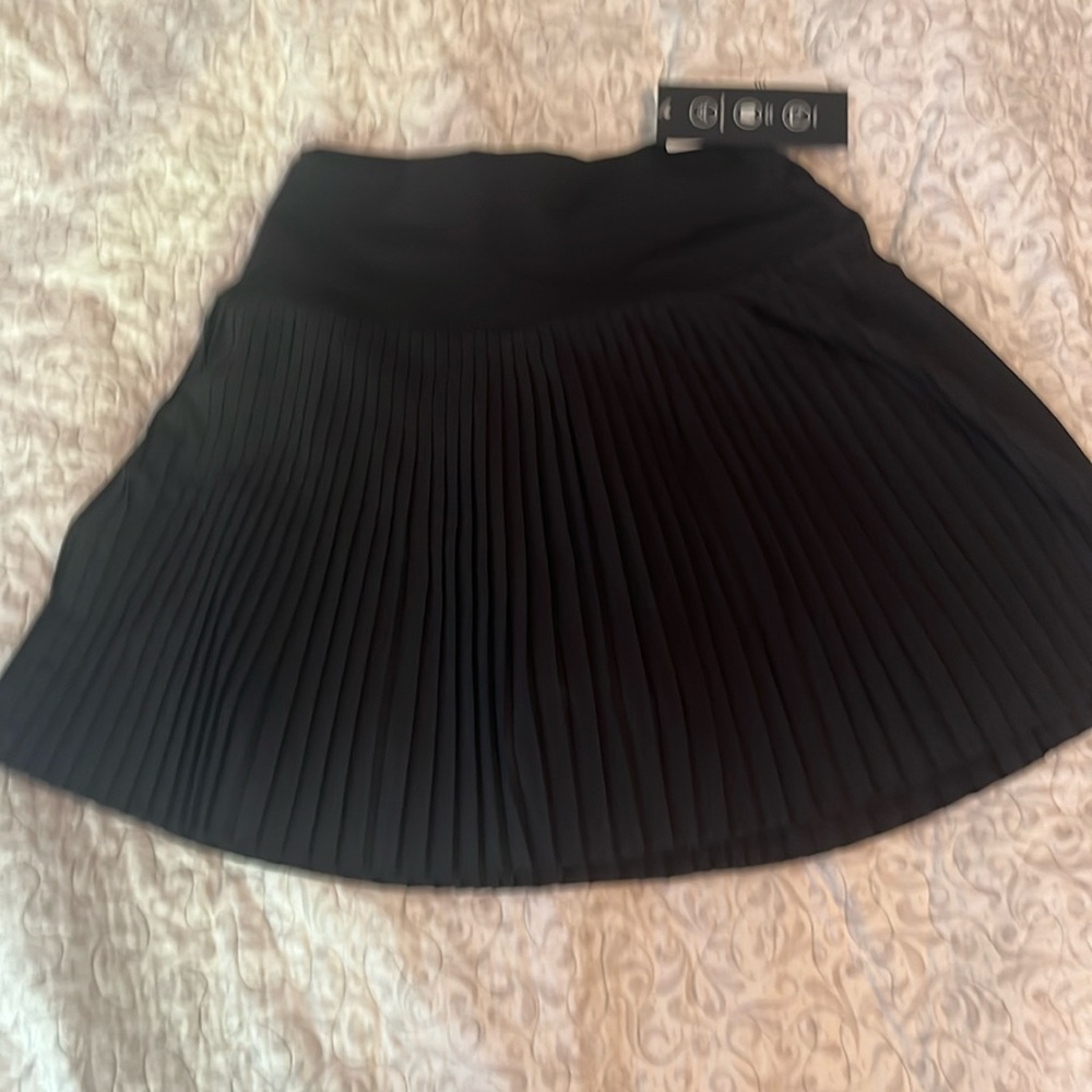 Black pleaded Gilly Hicks skirt extra small built-in shorts